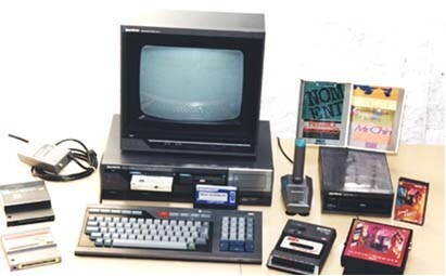 Um Expert MSX da Gradiente com gravador, joystick e outros acessórios