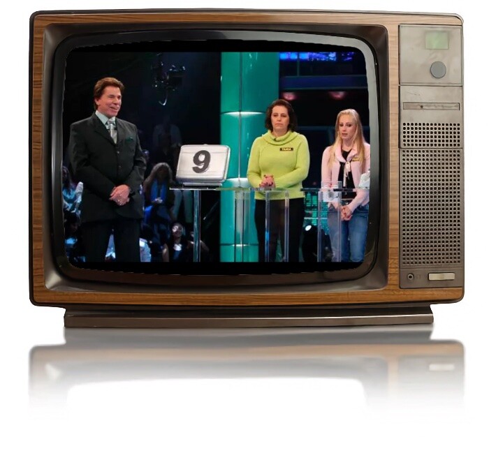 Sílvio Santos e participantes do seu game show