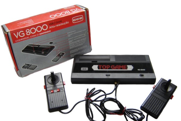 Um Top Game com 2 controles e a caixa original