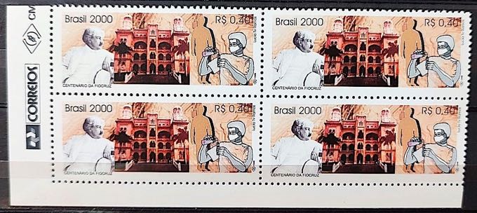 Uma quadra do selo postal comemorativo do centenário da Fiocruz.