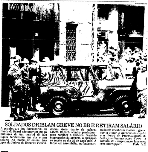 Foto de soldados e jipe militar em frente ao BB, e matéria com o título: Soldados driblam greve no BB e retiram salário