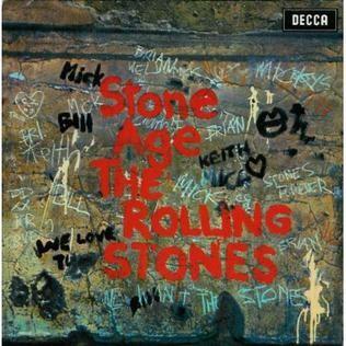 Capa do disco Stone Age, com foto de pichação em uma pedra.