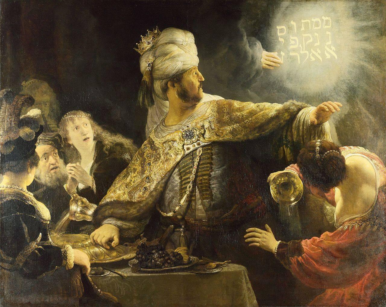 Um monarca, em meio a um banquete, contempla inscrições que aparecem em meio a fulgurante brilho, junto a uma mão celestial. <br><br>A Festa de Baltasar, c. 1635, óleo sobre tela, 167 cm x 209 cm, Rembrandt, National Gallery, Londres.